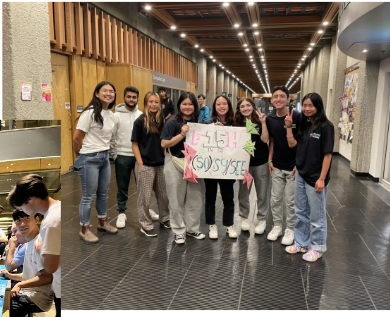 ESSS students posing together in a campus hallway